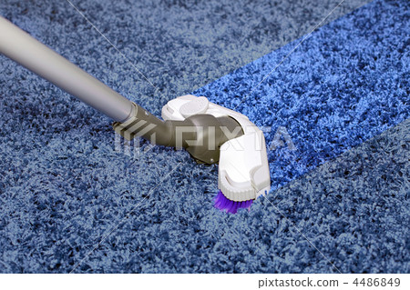 The metal pipe of vacuum cleaner in action The metal pipe of vacuum cleaner in action 4486849