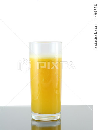 Glass of fresh orange juic? on  grey  background. 4499858