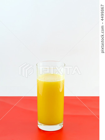 Glass of fresh orange juic? on red background. Glass of fresh orange juic? on red background. 4499867