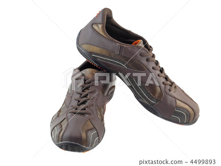 Pair of leather brown sneakers. Isolated 4499893