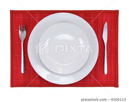 Table serving-dishware on red backdrop. 4500113
