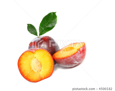 Heap of plums with green leaf. Isolated. 4500182