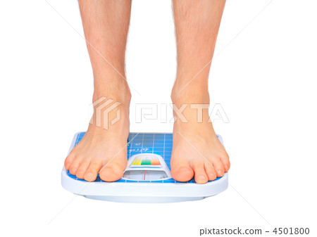 Man's legs ,which weighed on floor scale. Isolated 4501800