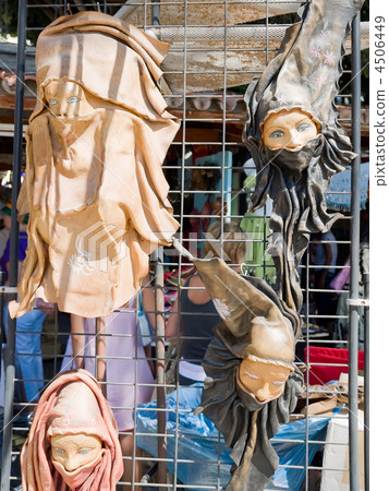 Souvenir masks -Arabian women made of a leather. 4506449