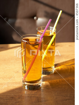 Two glasses of fresh apple juice. Two glasses of fresh apple juice. 4507366