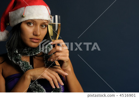 beautiful woman drinking champagne into Christmas 4516901