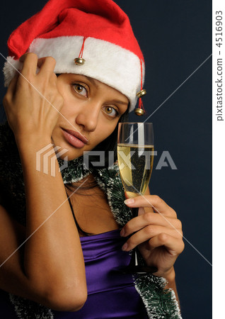 beautiful woman drinking champagne into Christmas 4516903