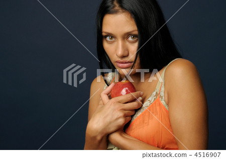 Beautiful exotic woman with apple 4516907