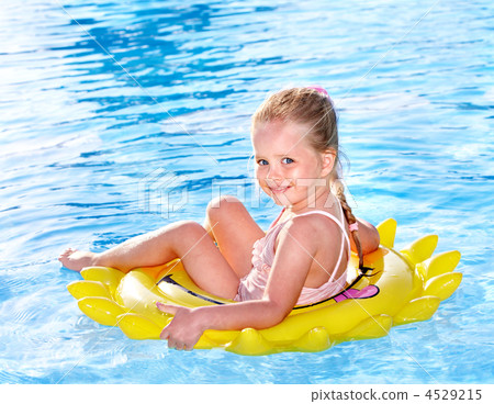Child  on inflatable ring . 4529215