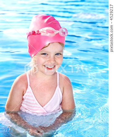 Kid in swimming pool. Kid in swimming pool. 4529217
