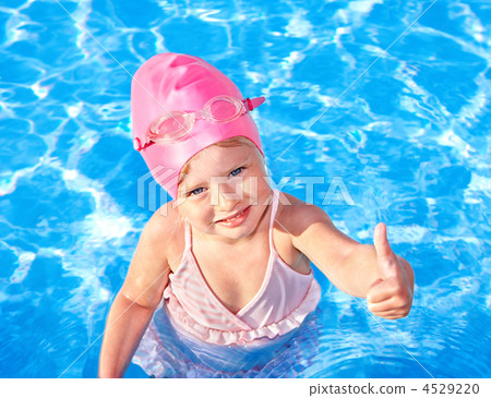 Child swimming in pool. Child swimming in pool. 4529220
