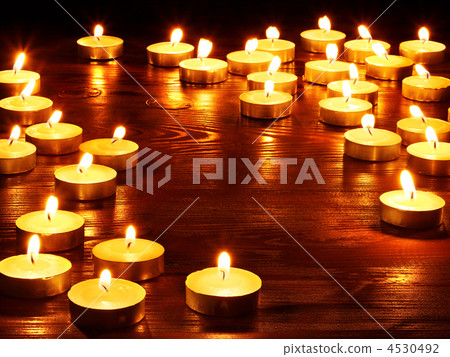 Group of burning candles. Group of burning candles. 4530492