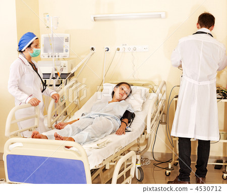 Doctor treats patient with stethoscope. 4530712