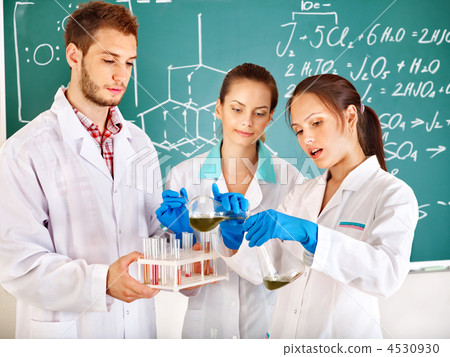 Group chemistry student with flask. Group chemistry student with flask. 4530930