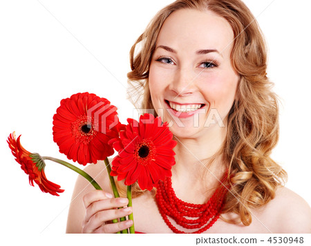 Happy young woman holding flowers. 4530948