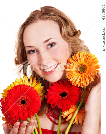 Happy young woman holding flowers. 4530961