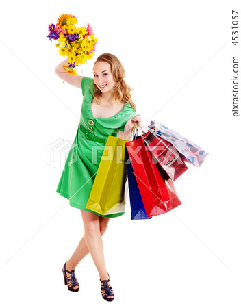 Young woman with shopping bag. Young woman with shopping bag. 4531057