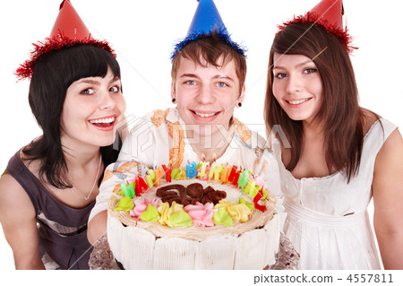 Group of happy young people with cake. Group of happy young people with cake. 4557811
