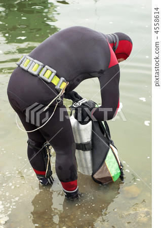 scuba diver in wet suit scuba diver in wet suit 4558614