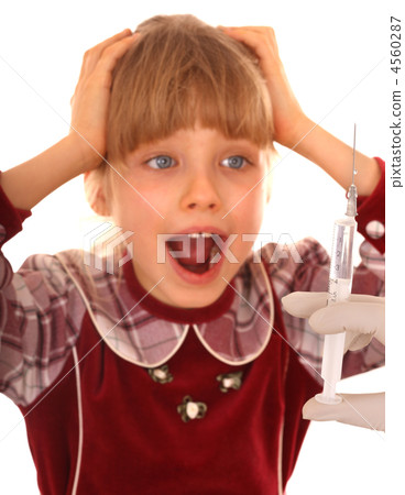Emotion portrait of child and syringe. Emotion portrait of child and syringe. 4560287