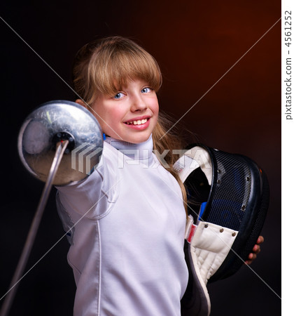 Child epee fencing lunge. Child epee fencing lunge. 4561252