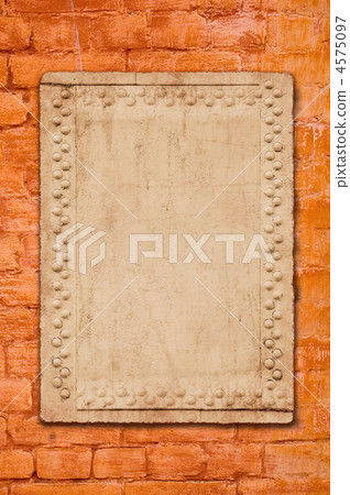 metal plate on brick wall - perfect grunge background 4575097
