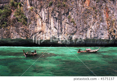 longtail boats in turquoise waters 4575137