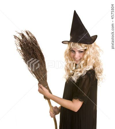 Halloween witch blond in black dress and hat with broom. Halloween witch blond in black dress and hat with broom. 4575804