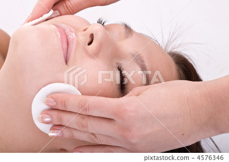 Beautiful woman in spa. Facial massage. Beautiful woman in spa. Facial massage. 4576346