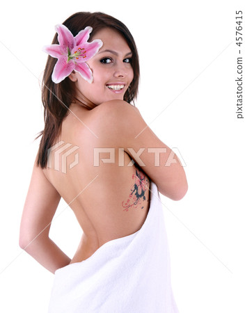 Beautiful girl with tattoo and flower. 4576415