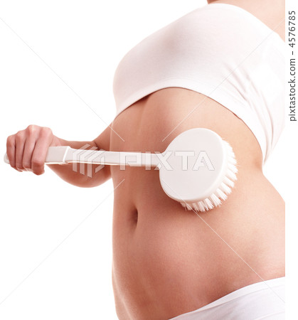 Young woman scrubbing body. Young woman scrubbing body. 4576785