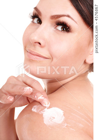 Beautiful girl apply cream. 4576867