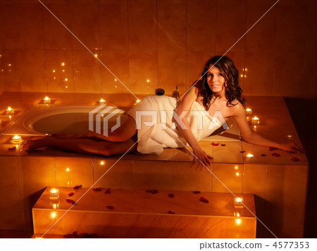 Woman relaxing in sauna. Woman relaxing in sauna. 4577353