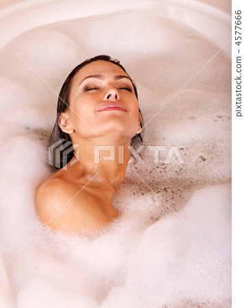 Woman relaxing in bath. 4577666