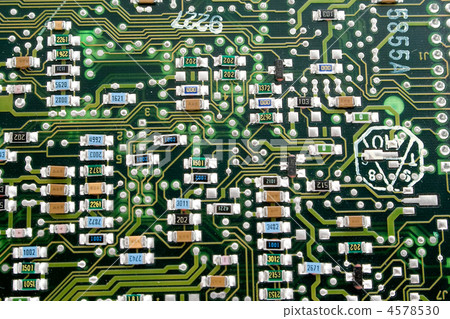 Fragment of an old computer board. A background Fragment of an old computer board. A background 4578530