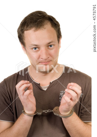 The guy chained in handcuffs. Isolated 2 4578791