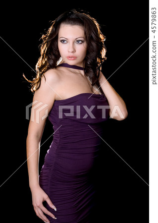 The beautiful young woman in a violet dress 4579863