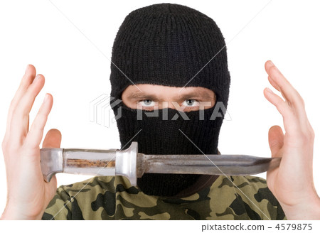 The man with a knife in a black mask. Isolated The man with a knife in a black mask. Isolated 4579875