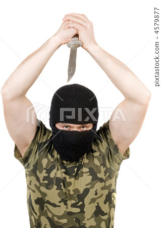 The killer with a knife in a black mask over white The killer with a knife in a black mask over white 4579877