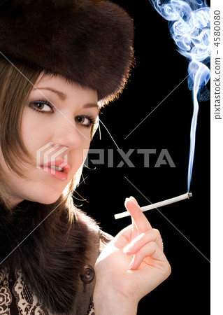 Portrait of the young woman with a cigarette Portrait of the young woman with a cigarette 4580080