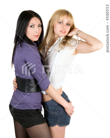 Portrait of the two sexy young girlfriends. Isolated Portrait of the two sexy young girlfriends. Isolated 4580553