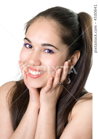 Portrait of the smiling beautiful girl. Isolated 4580641