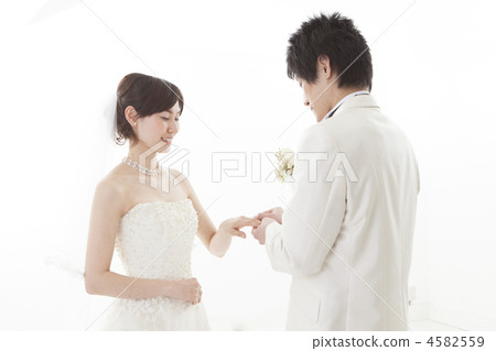 bridal couple, bride and groom, exchange rings 4582559