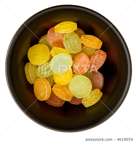 Color pastiles sweets in a black plate 4619059