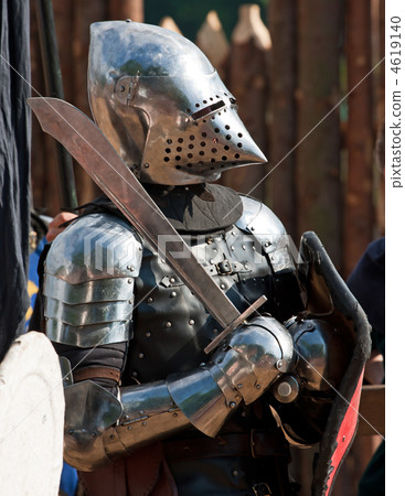 Knight in armour with shield and sword 4619140