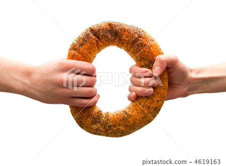 Hands holding ring bread 4619163