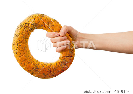 Hand holding ring bread Hand holding ring bread 4619164