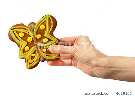 Gingerbread butterfly in hand Gingerbread butterfly in hand 4619165