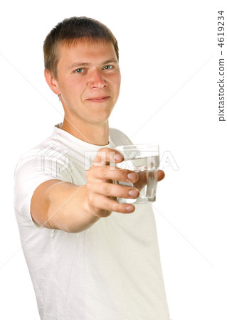 Young man giving a glass of water 4619234
