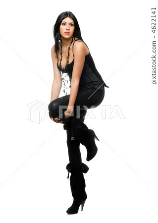 Lovely brunette in black leggings. Isolated Lovely brunette in black leggings. Isolated 4622141